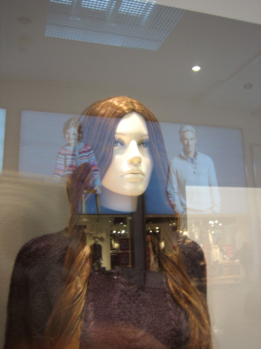 Mannequin in shop window.